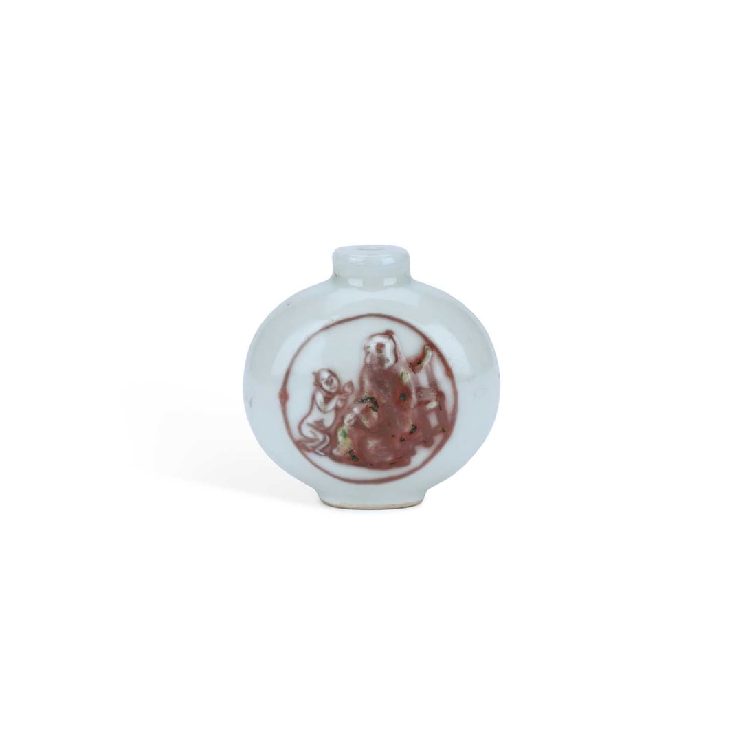 A CHINESE PORCELAIN SNUFF BOTTLE: A CHINESE PORCELAIN SNUFF BOTTLE of flattened circular form, each side decorated in iron-red with moulded circular panels depicting figures. 6cm high