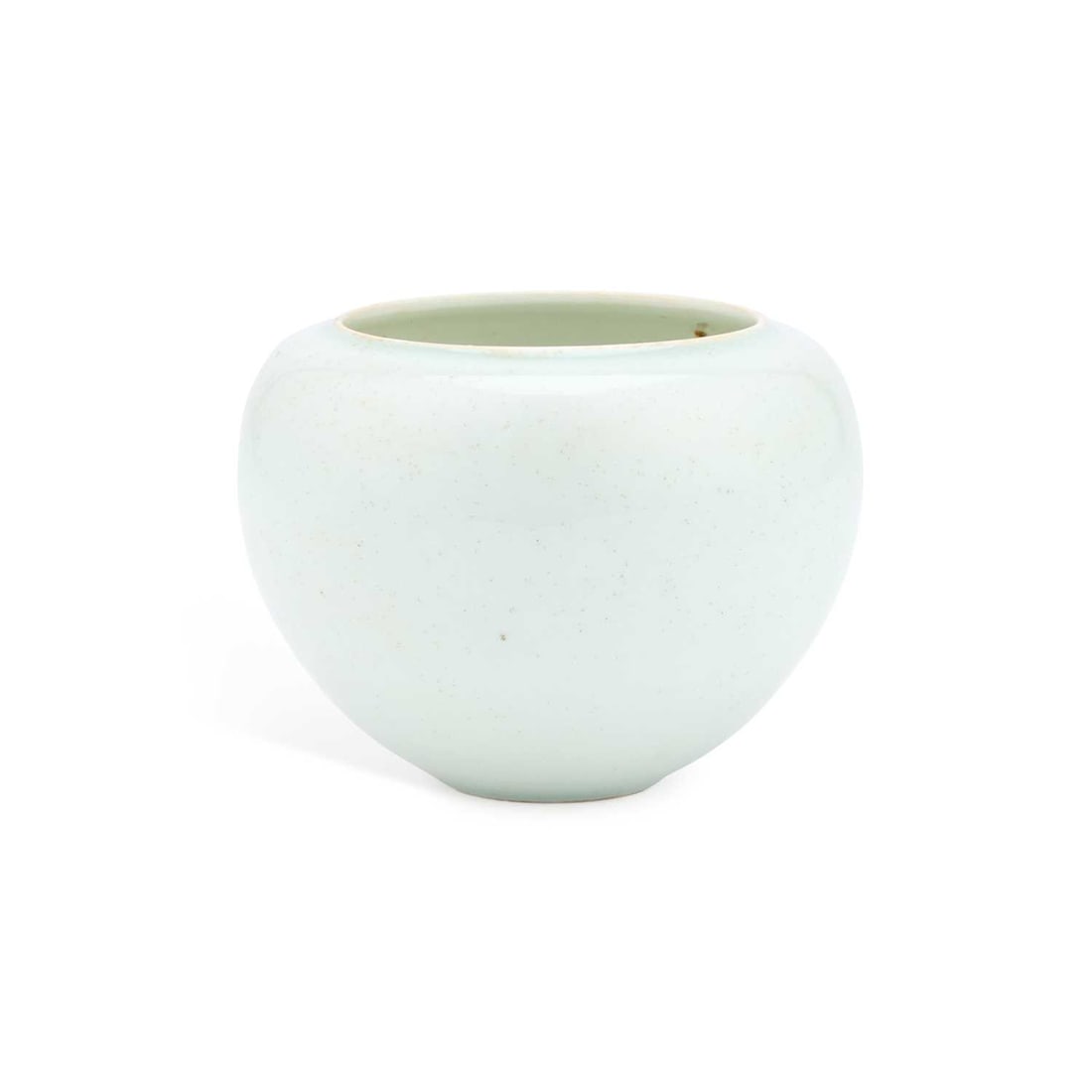 A CHINESE QINBAI WATER POT, SONG STYLE: A CHINESE QINBAI WATER POT, SONG STYLE the finely potted vessel with an incised double bowstring band above the foot, decorated in a pale aquamarine glaze, darkening around the slightly raised rim.