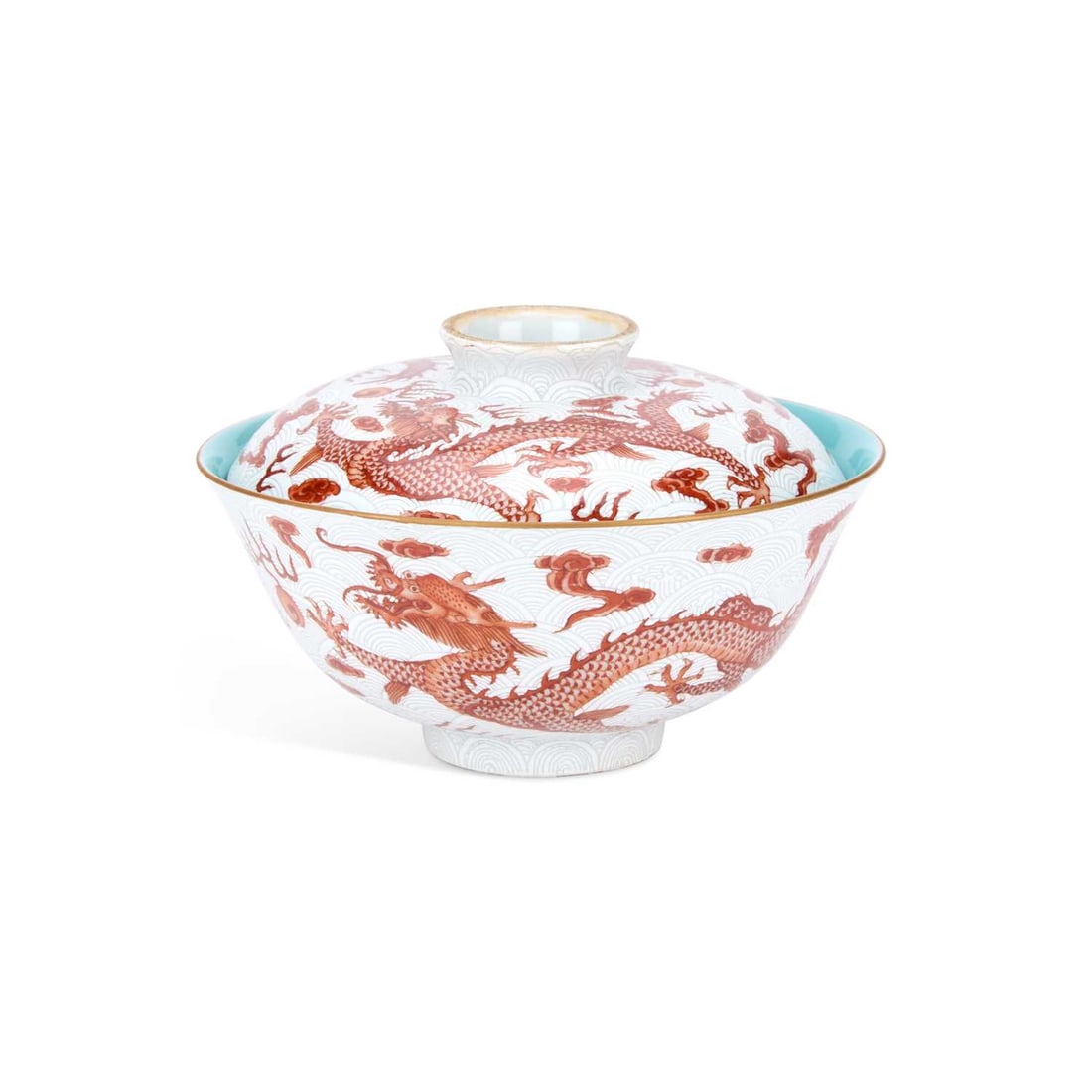 A CHINESE PORCELAIN DRAGONS BOWL AND COVER: A CHINESE PORCELAIN DRAGONS BOWL AND COVER the bowl painted in iron-red with dragons chasing flaming pearls, amongst white enamelled clouds, the cover similarly decorated, Qianlong six character