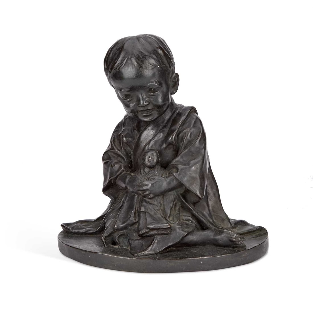 A JAPANESE BRONZE OKIMONO MEIJI PERIOD (1868-1912): A JAPANESE BRONZE OKIMONO MEIJI PERIOD (1868-1912) cast as a seated child in traditional costume, holding a doll, set upon an oval base. 31cm high, 31cm wide