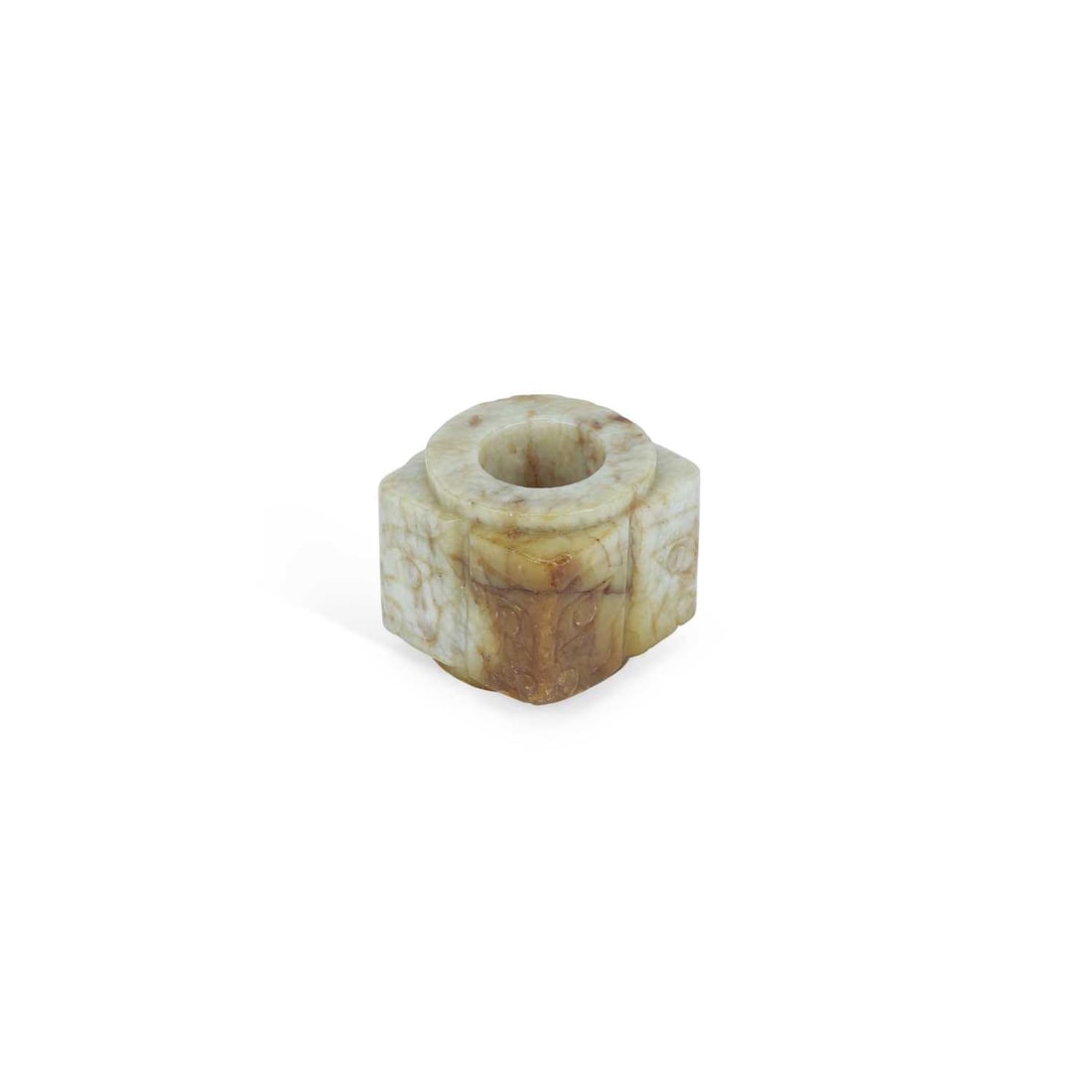 A CHINESE JADE ARCHER’S RING: A CHINESE JADE ARCHER’S RING of square-section form, carved with stylised taotie masks, the stone with pale celadon and russet inclusions. 3.2cm square