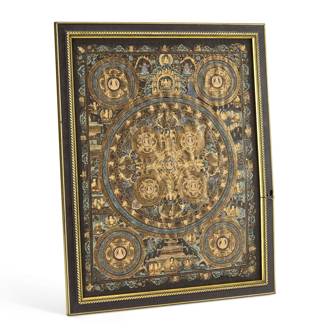 A TIBETAN THANGKA 20TH CENTURY: A TIBETAN THANGKA 20TH CENTURY painted in gilt with a large central panel of the wheel of life, surrounded by further wheels, and figural decoration, on a black ground, framed. 45cm by 36cm