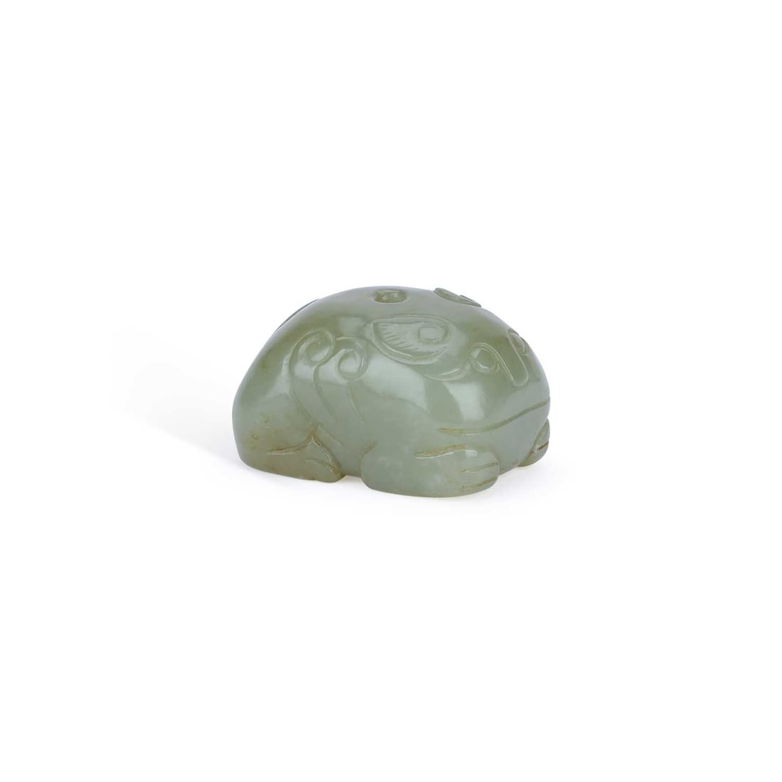 A CHINESE CELADON JADE MYTHICAL BEAST PENDANT (1 of 4)
