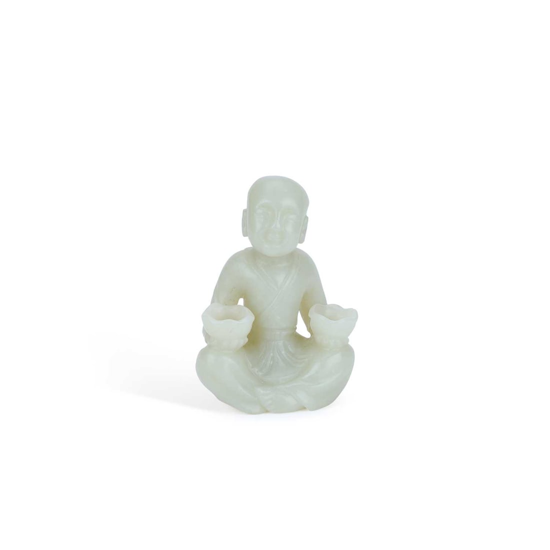 A CHINESE PALE CELADON JADE CARVING OF A SEATED BOY (1 of 19)