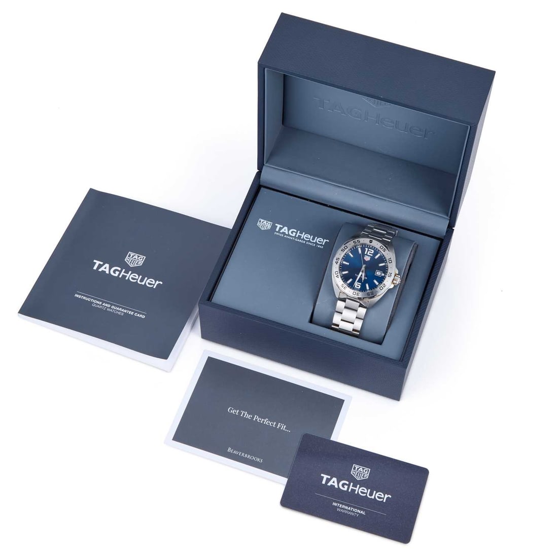 A GENTS STEEL TAG HEUER FORMULA 1 BRACELET WATCH: A GENTS STEEL TAG HEUER FORMULA 1 BRACELET WATCH the circular blue dial signed TAG Heuer Formula 1, with baton indices and Arabic numerals at 6/ 12, luminous hands, date aperture at the 3 o'clock