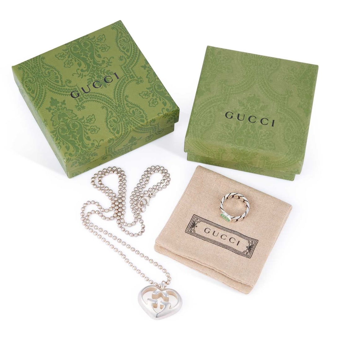 A GUCCI 'LOVE BRITT' HEART PENDANT NECKLACE AND A GUCCI RING (1 of 1)