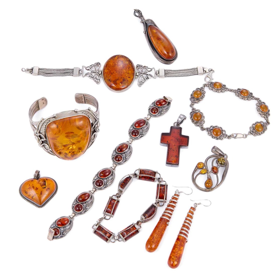 A GROUP OF SILVER AND AMBER JEWELLERY (1 of 1)