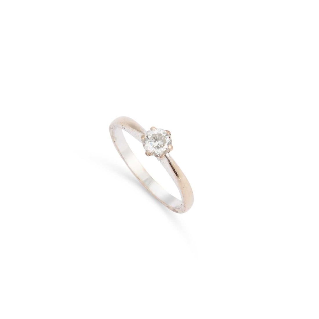 AN 18 CARAT WHITE GOLD SOLITAIRE DIAMOND RING: AN 18 CARAT WHITE GOLD SOLITAIRE DIAMOND RING a brilliant-cut diamond ring in a claw setting, hallmarked London 2001. Stated diamond weight 0.50 carat, ring size P1/2, 3.4 grams Good condition. Estima