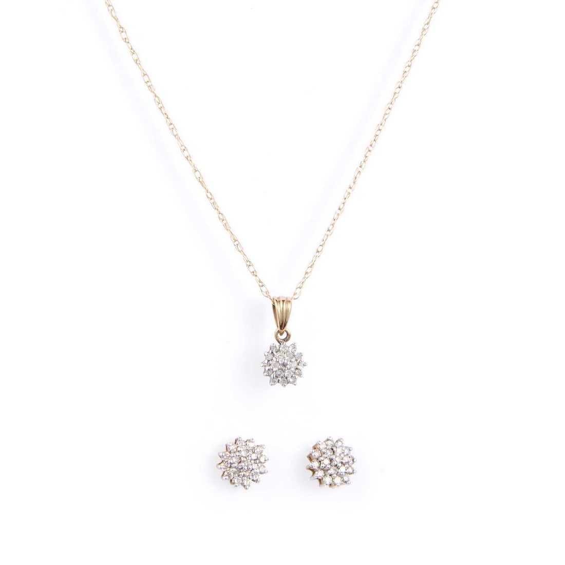 A DIAMOND CLUSTER PENDANT ON CHAIN AND STUD EARRING SET: A DIAMOND CLUSTER PENDANT ON CHAIN AND STUD EARRING SET clusters of round-cut diamonds, the pendant to a fancy fine chain, the earrings with post fittings, stamped '375'. (2) Estimated total diamond w