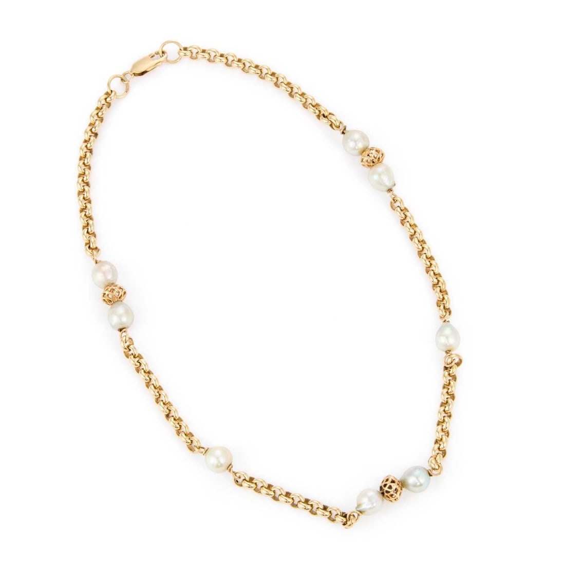 A 9 CARAT GOLD CULTURED PEARL NECKLACE: A 9 CARAT GOLD CULTURED PEARL NECKLACE baroque pearls spaced by sections of belcher chain and fancy links, hallmarked Sheffield. 43cm long, 32 grams Good condition
