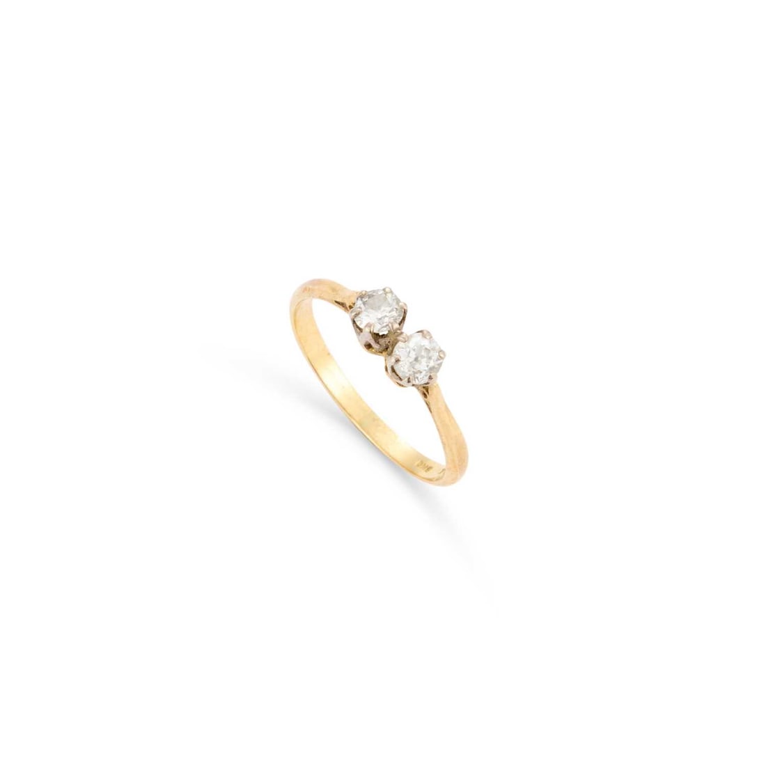 AN 18 CARAT GOLD DIAMOND TWO STONE RING: AN 18 CARAT GOLD DIAMOND TWO STONE RING two old-cut diamonds in claw settings, hallmarked London 1980. Estimated total diamond weight 0.45 carat, ring size K, 1.9 grams Good condition. Estimated