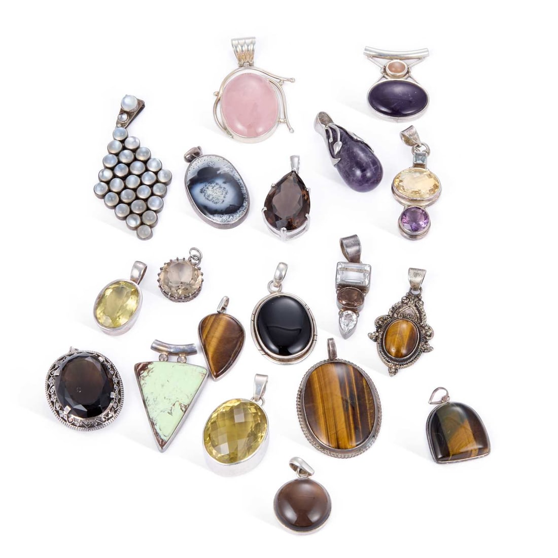 A GROUP OF GEM-SET SILVER PENDANTS (1 of 1)