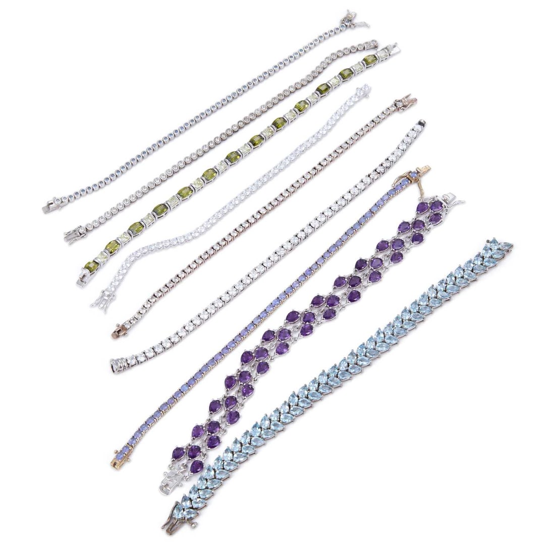 A GROUP OF GEM-SET SILVER BRACELETS (1 of 1)