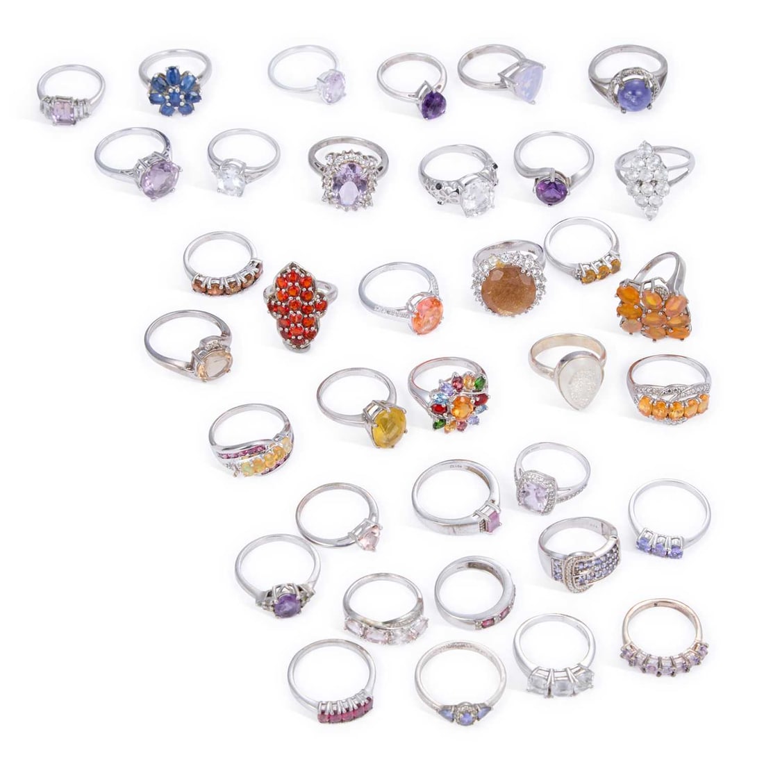 A GROUP OF GEM-SET SILVER RINGS (1 of 1)
