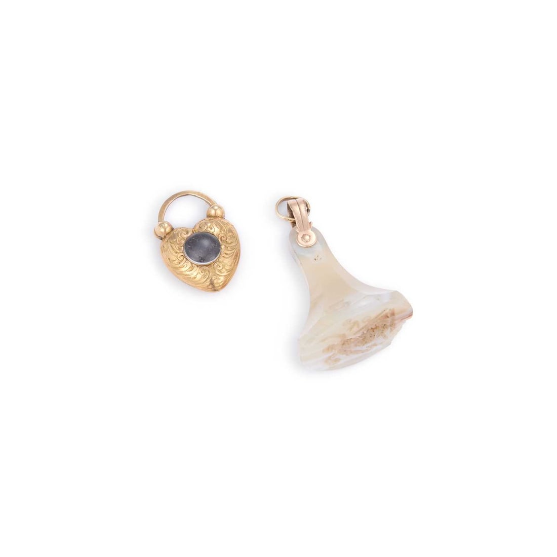 A HEART PADLOCK CLASP AND AN AGATE FOB SEAL: A HEART PADLOCK CLASP AND AN AGATE FOB SEAL comprising the heart padlock foliate engraved with a glazed centre; the seal intaglio engraved with the allegorical figure of Hope, both unmarked. (2) Padlo
