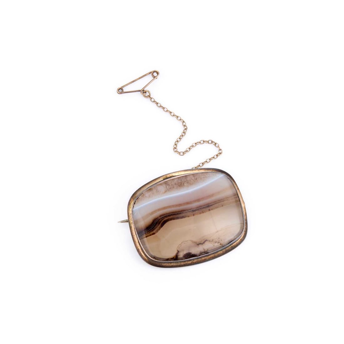 A VICTORIAN AGATE BROOCH: A VICTORIAN AGATE BROOCH the cushion-cut agate within a plain frame, stamped '9CT'. 3.8cm long, 11.4 grams Light general wear