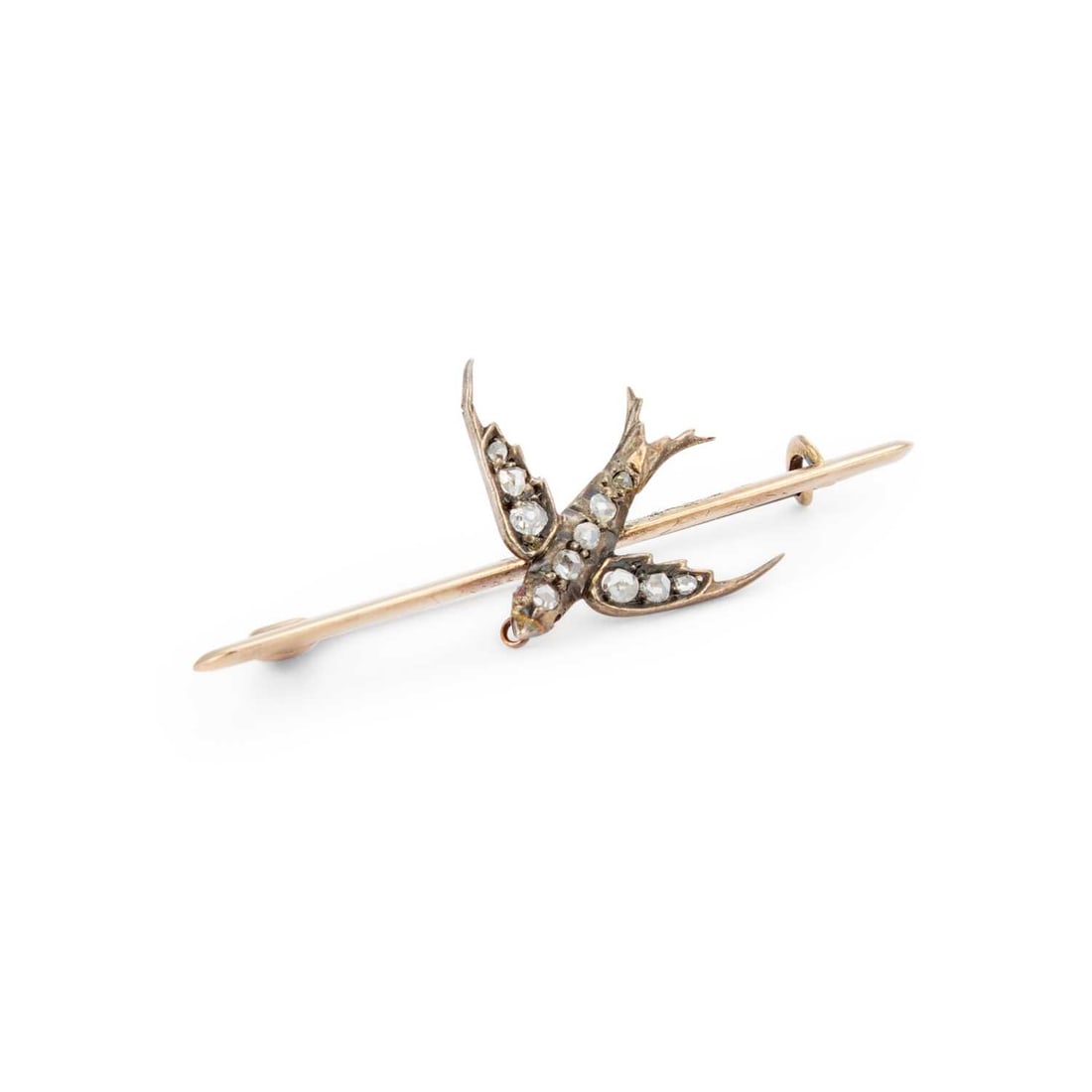 A ROSE-CUT DIAMOND SWIFT BROOCH: A ROSE-CUT DIAMOND SWIFT BROOCH modelled in flight and set throughout with rose-cut diamonds, to a knife-edge bar, unmarked. 4.5cm long, 2.6 grams Good condition