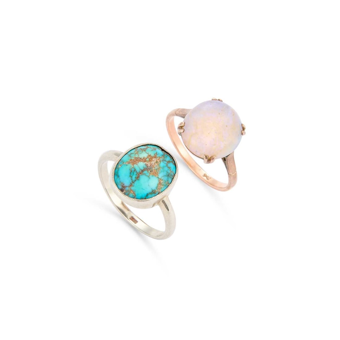 TWO GEM-SET RINGS: TWO GEM-SET RINGS comprising an opal ring, stamped '9CT'; and a turquoise ring, stamped '9CT'. (2) Ring size N1/2 and K, 6.1 grams gross Abrasion to the opal with a generally dull appearance