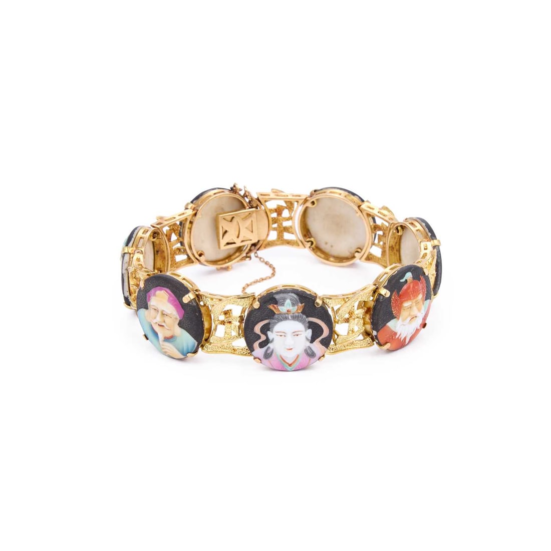 A JAPANESE ARITA SEVEN LUCKY GODS ENAMEL PORCELAIN BRACELET CIRCA 1930: A JAPANESE ARITA SEVEN LUCKY GODS ENAMEL PORCELAIN BRACELET CIRCA 1930 formed of seven circular enamel plaques, each depicting the bust of the seven lucky gods, spaced by textured character links, ind