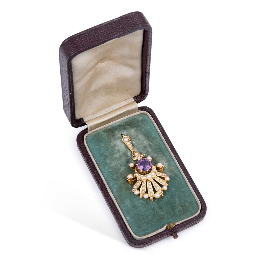 AN EDWARDIAN AMETHYST AND SEED PEARL PENDANT BROOCH: AN EDWARDIAN AMETHYST AND SEED PEARL PENDANT BROOCH a round-cut amethyst set within a seed pearl set fan frame, with a removeable bail, unmarked, in a fitted case. 4cm long, 6.3 grams Good condition, 
