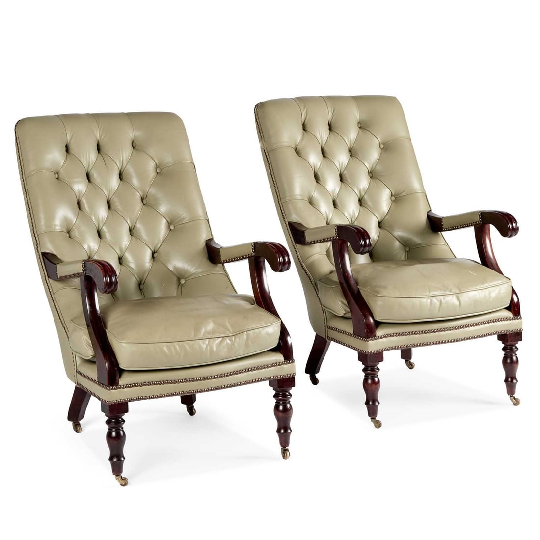 A PAIR OF GREEN LEATHER UPHOLSTERED BUTTON-BACK LIBRARY CHAIRS (1 of 1)