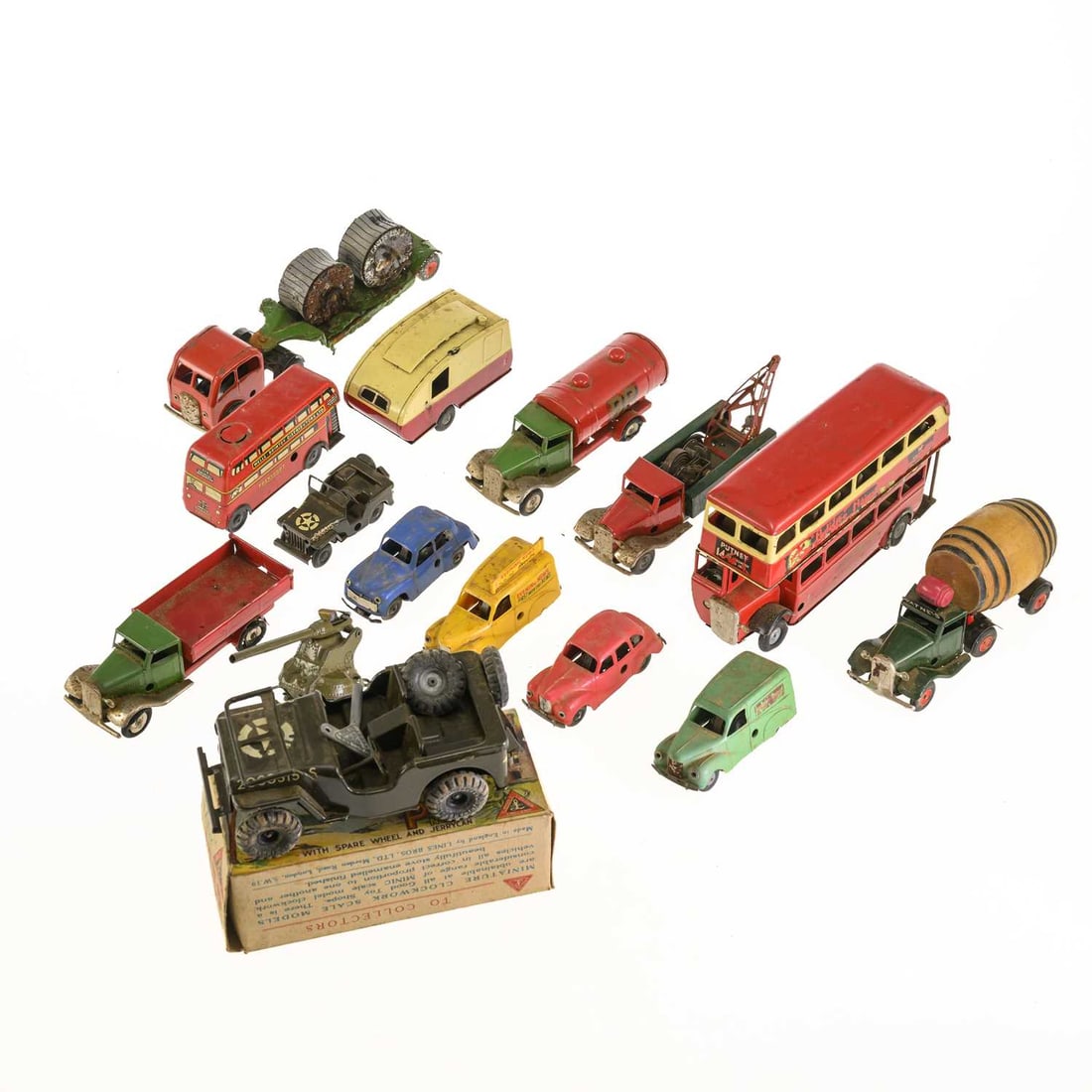 A GROUP OF TRI-ANG MINIC TINPLATE TOYS: A GROUP OF TRI-ANG MINIC TINPLATE TOYS including a U.S Jeep No.2, boxed; London Transport Double Decker bus; a friction powered Austin A40 van, in yellow Evening News livery; etc. (Qty)