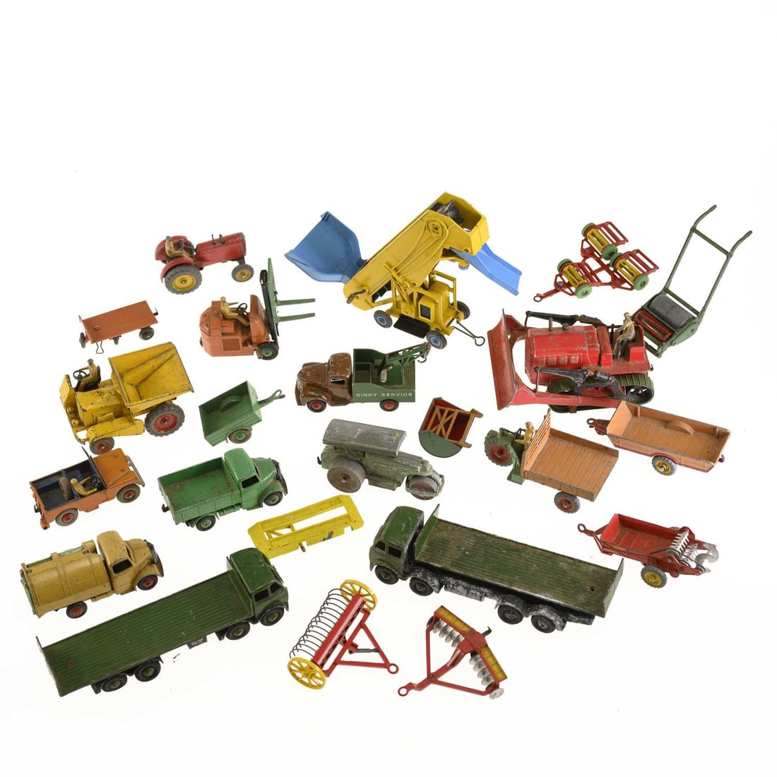 A COLLECTION OF DINKY DIECAST MODELS: A COLLECTION OF DINKY DIECAST MODELS including a elevator loader, no. 564, boxed; a Blaw Knox Bulldozer, no. 561; a Dinky Supertoys Muir-Hill Dumper; etc. (Qty)