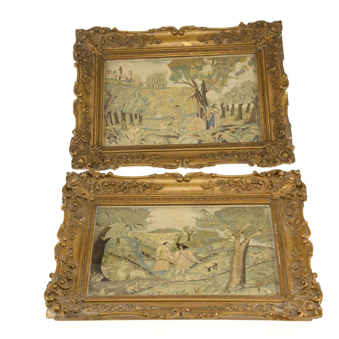 A PAIR OF DUTCH SILK EMBROIDERED PICTURES: A PAIR OF DUTCH SILK EMBROIDERED PICTURES depicting scenes from Jacob Cats’ Het Spaens Heydinnetje (The Spanish Gypsy Girl), worked in coloured threads and framed in ornate gilt-composition frames, 