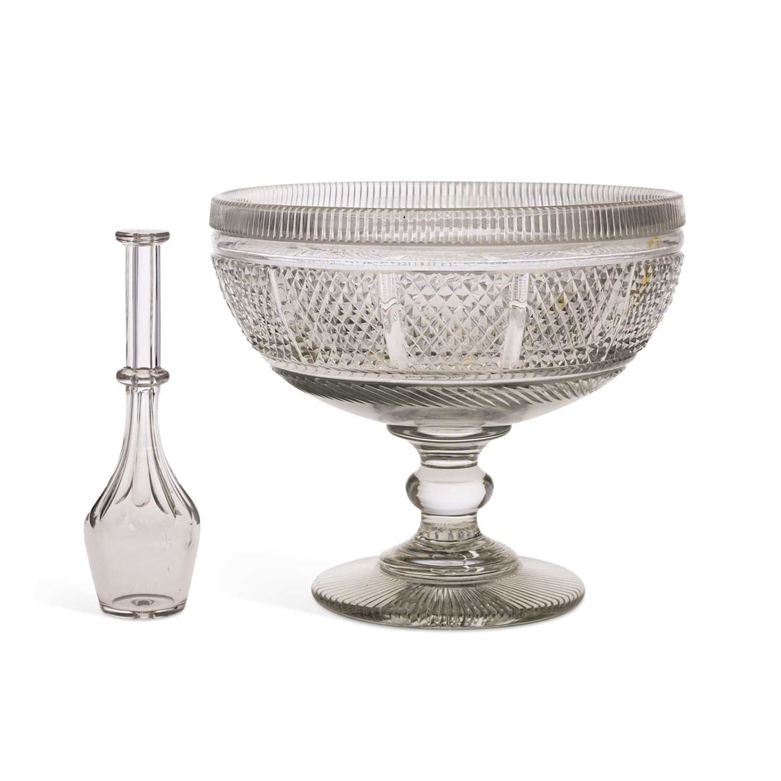 A GEORGIAN CUT-GLASS PUNCH BOWL AND TODDY LIFTER CIRCA 1830: A GEORGIAN CUT-GLASS PUNCH BOWL AND TODDY LIFTER CIRCA 1830 the deeply cut glass bowl, set upon a raised pedestal circular foot. (2) 21cm diameter, 17.5cm high