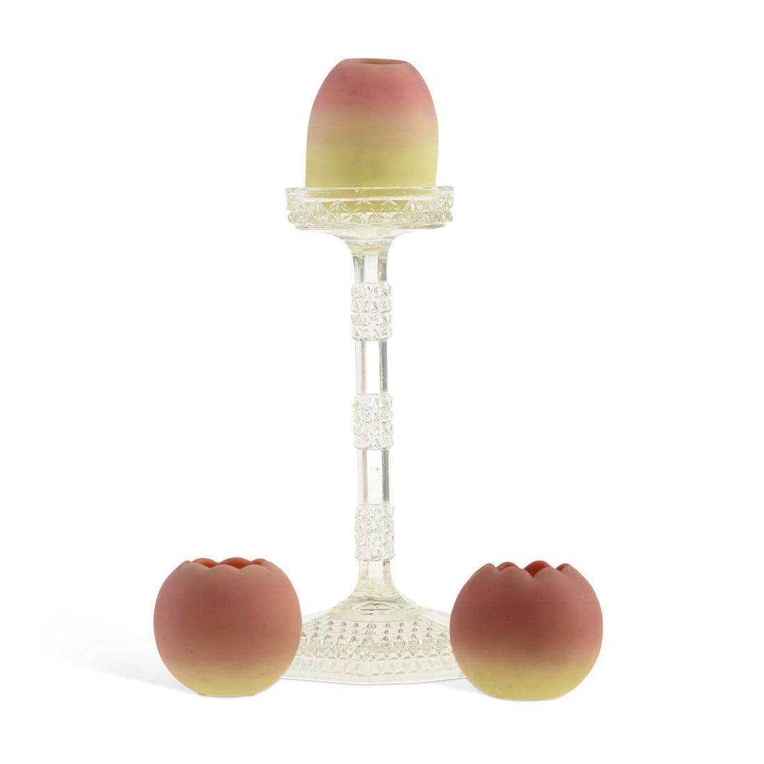 A PAIR OF SMALL BURMESE GLASS VASES AND A MATCHING NIGHT LIGHT LATE 19TH CENTURY: A PAIR OF SMALL BURMESE GLASS VASES AND A MATCHING NIGHT LIGHT LATE 19TH CENTURY each shaded from pink to yellow, the night light raised on a cut-glass pedestal stand. (3) Tallest 28.5cm overall