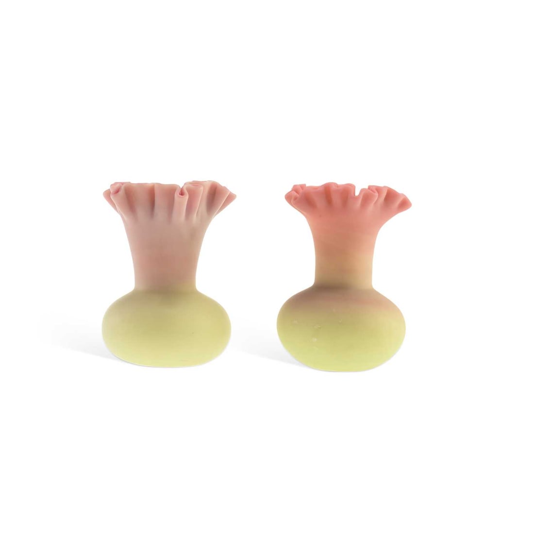 A PAIR OF BURMESE GLASS VASES LATE 19TH CENTURY: A PAIR OF BURMESE GLASS VASES LATE 19TH CENTURY each shaded from pink to yellow, with a bulbous body, slender neck and frilled rim. 9.5cm high