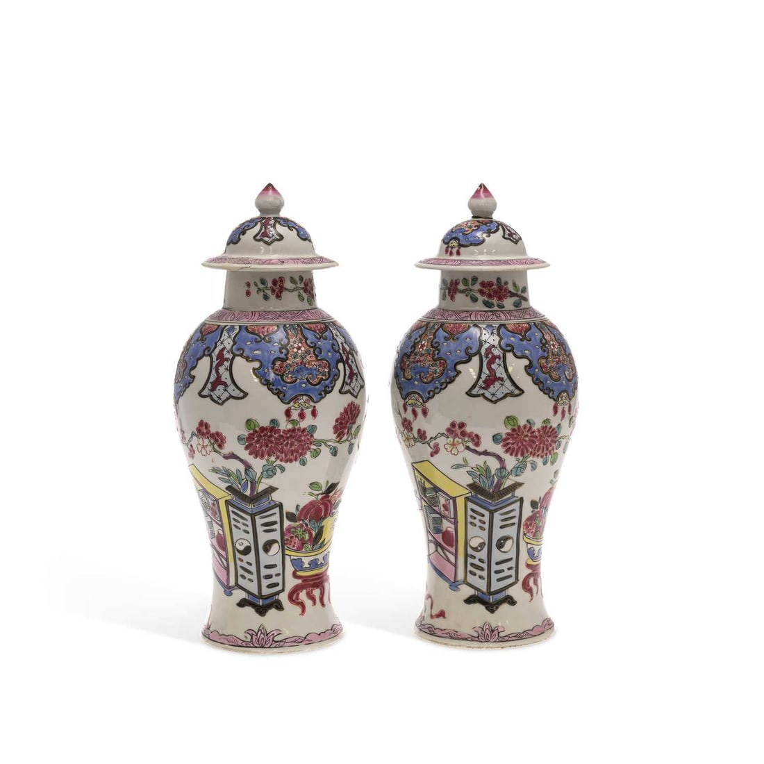 A PAIR OF SAMSON CHINESE STYLE VASES AND COVERS CIRCA 1890: A PAIR OF SAMSON CHINESE STYLE VASES AND COVERS CIRCA 1890 each of baluster form, decorated in Chinese famille rose style, with flowering plants and fruit amongst tables and vases. (2) 32cm high