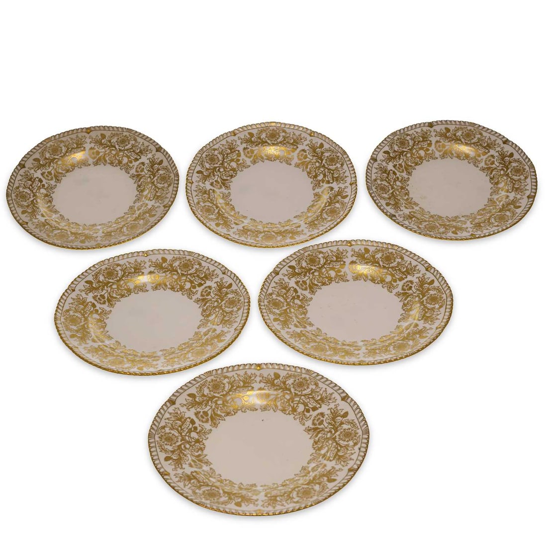 A SET OF SIX ROYAL CROWN DERBY PLATES DATED 1974: A SET OF SIX ROYAL CROWN DERBY PLATES DATED 1974 the plates decorated in the Brocade pattern of gilt flowering plants, within a moulded gadroon rim. (6) 26.5cm diameter