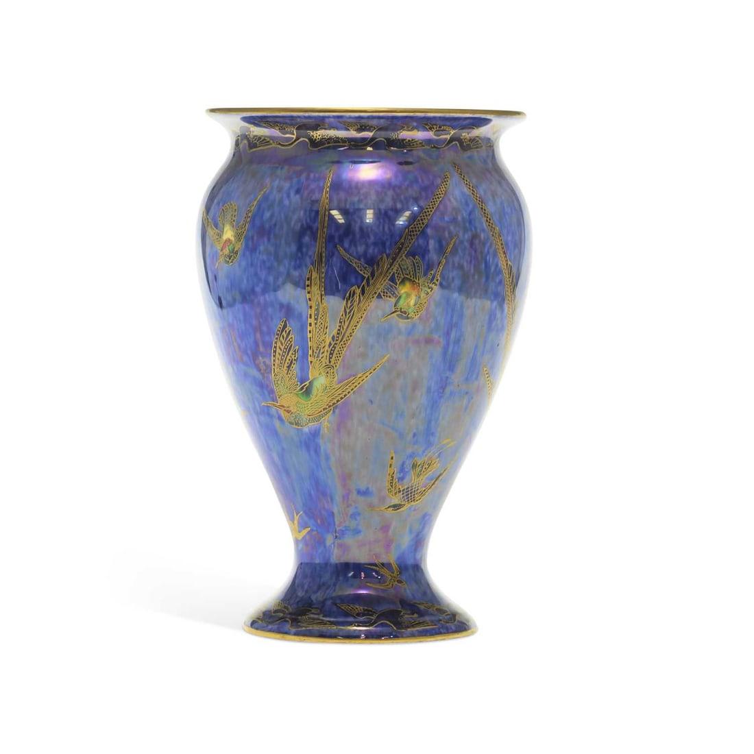A WEDGWOOD LUSTRE HUMMINGBIRDS VASE CIRCA 1930: A WEDGWOOD LUSTRE HUMMINGBIRDS VASE CIRCA 1930 decorated with hummingbirds on a mottled blue ground, beneath a lustrous glaze, heightened in gilt, printed factory marks. 23cm high