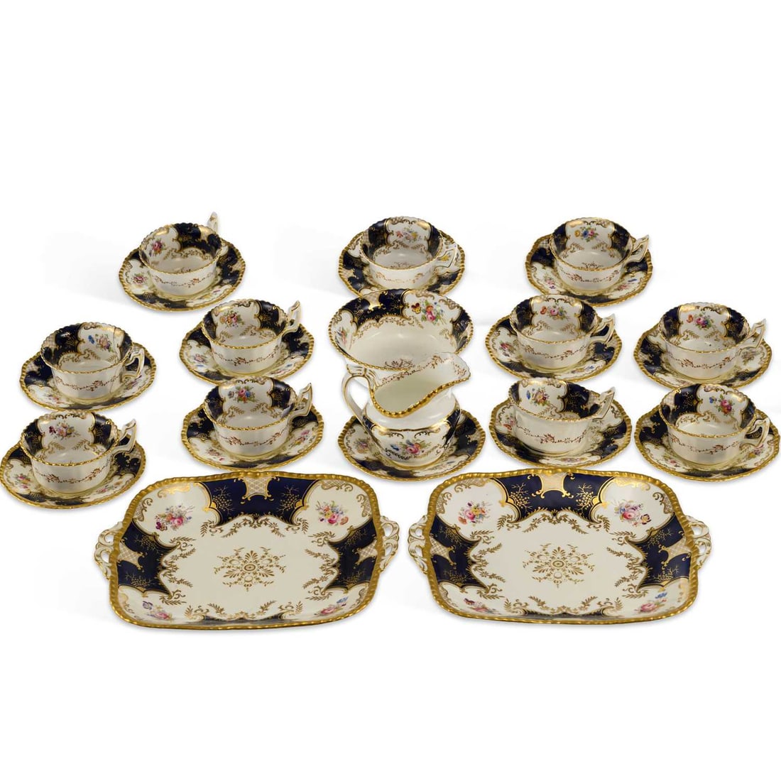 A COALPORT PORCELAIN BAT WING PARTIAL TEA SERVICE CIRCA 1920: A COALPORT PORCELAIN BAT WING PARTIAL TEA SERVICE CIRCA 1920 comprising of eleven cups and saucers, eleven side plates, a cream jug, sugar bowl and two sandwich plates, printed marks. (Qty) Sandwich p