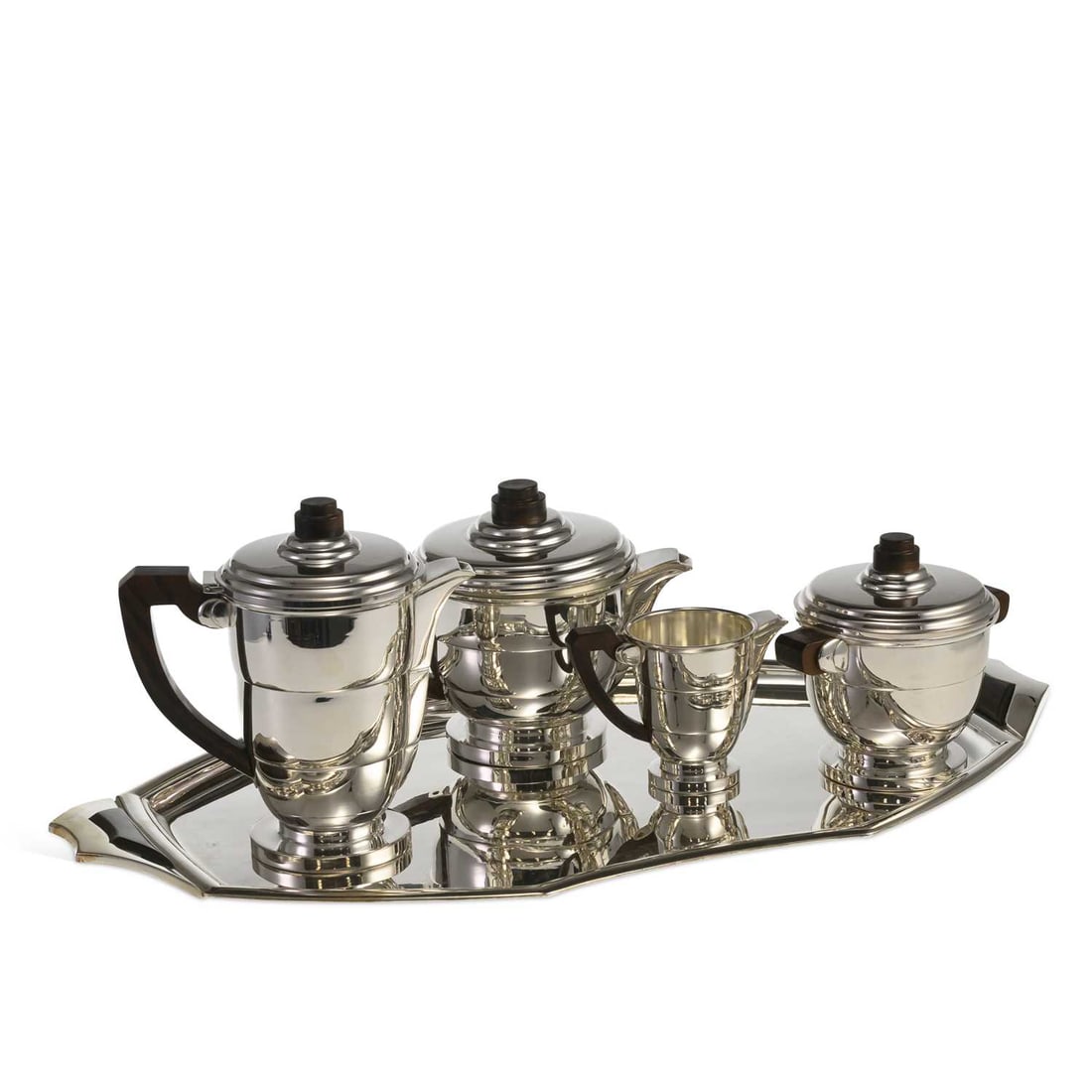 V AN ART DECO FRENCH SILVER-PLATED FIVE-PIECE TEA SERVICE: V AN ART DECO FRENCH SILVER-PLATED FIVE-PIECE TEA SERVICE makers mark JL, comprising a teapot, coffee pot, sugar bowl and cover, milk jug and a two-handled tray, of stepped geometric form, with rosewo