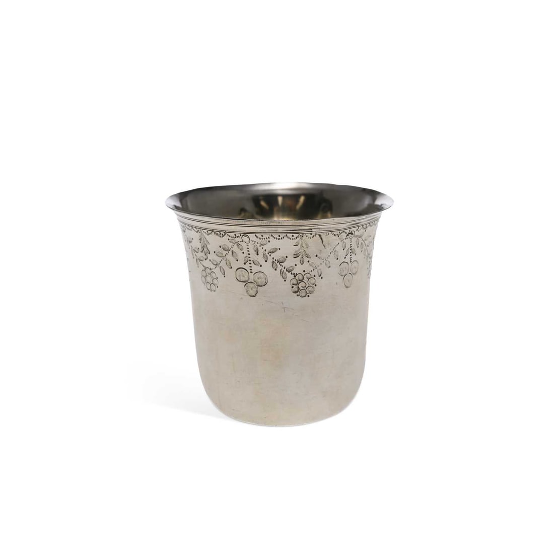 A FRENCH SILVER BEAKER: A FRENCH SILVER BEAKER early 19th century, of tapering cylindrical form, with a reeded rim, engraved with swag and berry motif. 6.75 high, 1.5 troy ounces
