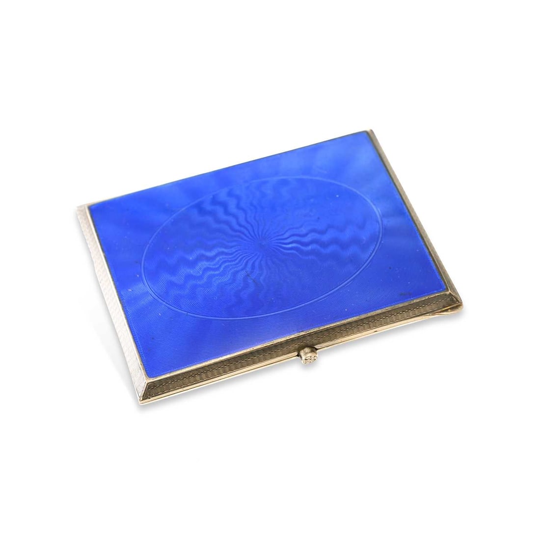 A CONTINENTAL ART DECO SILVER AND ENAMEL CIGARETTE CASE: A CONTINENTAL ART DECO SILVER AND ENAMEL CIGARETTE CASE import marked London 1927, of rectangular form with cobalt blue enamel and engine-turned decoration, the interior gilded. 8.75cm by 6.5cm by