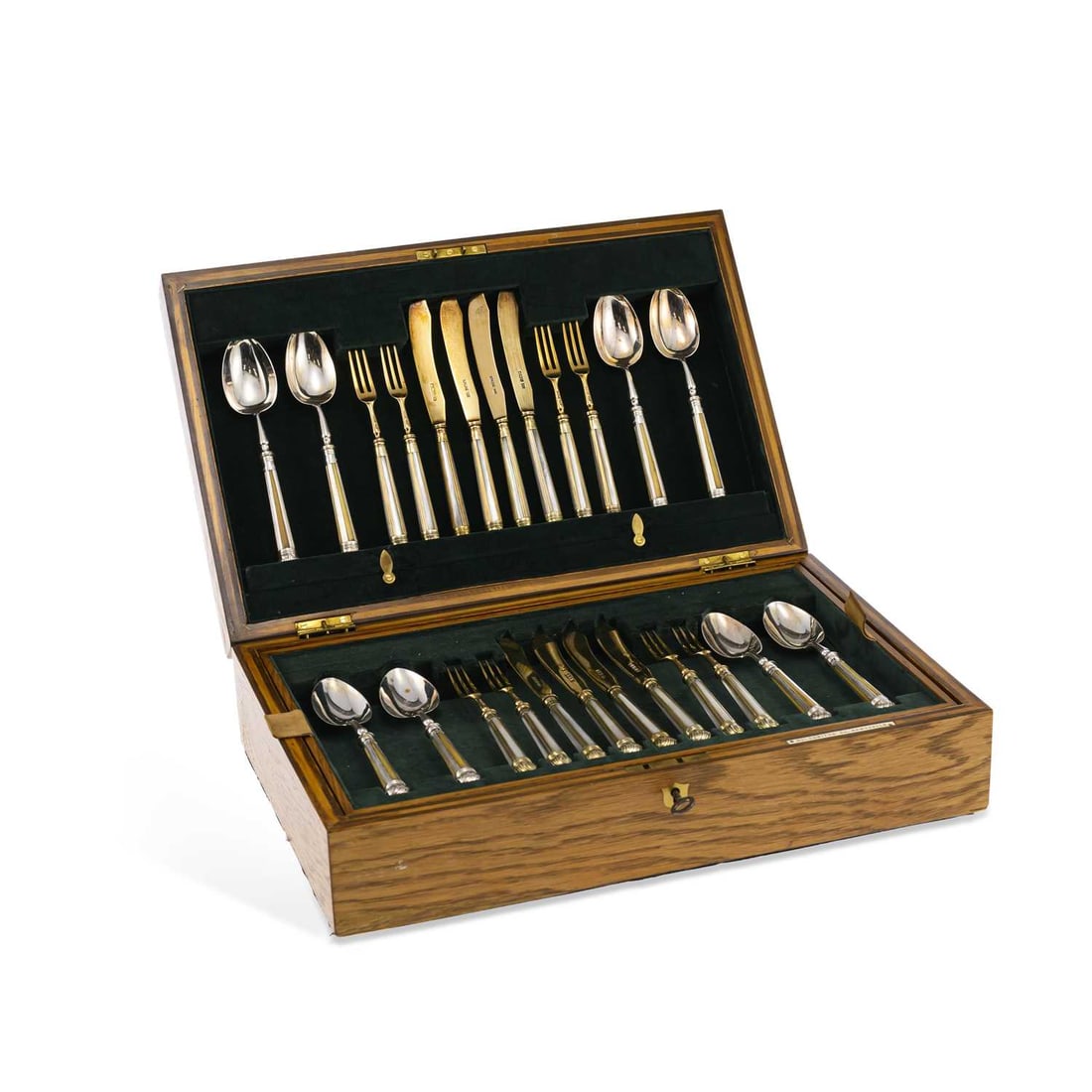 A GEORGE V CANTEEN OF SILVER AND MOTHER-OF-PEARL DESSERT KNIVES, FORKS AND SPOONS: A GEORGE V CANTEEN OF SILVER AND MOTHER-OF-PEARL DESSERT KNIVES, FORKS AND SPOONS matched, with twelve place settings. the spoons by Crichton Brothers, London 1919, the silver-gilt knives and forks by