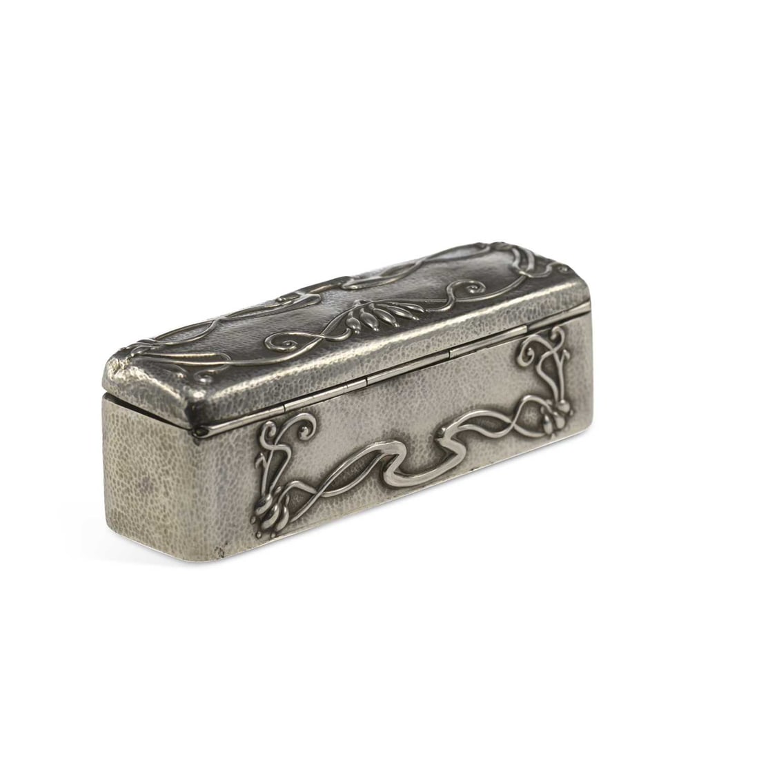 AN EDWARDIAN ART NOUVEAU SILVER BOX: AN EDWARDIAN ART NOUVEAU SILVER BOX by Deakin & Francis Ltd., Birmingham 1902, of rectangular form with a hinged cover, hammered and embossed decorated with stylised flowers and tendrils. 10cm by 