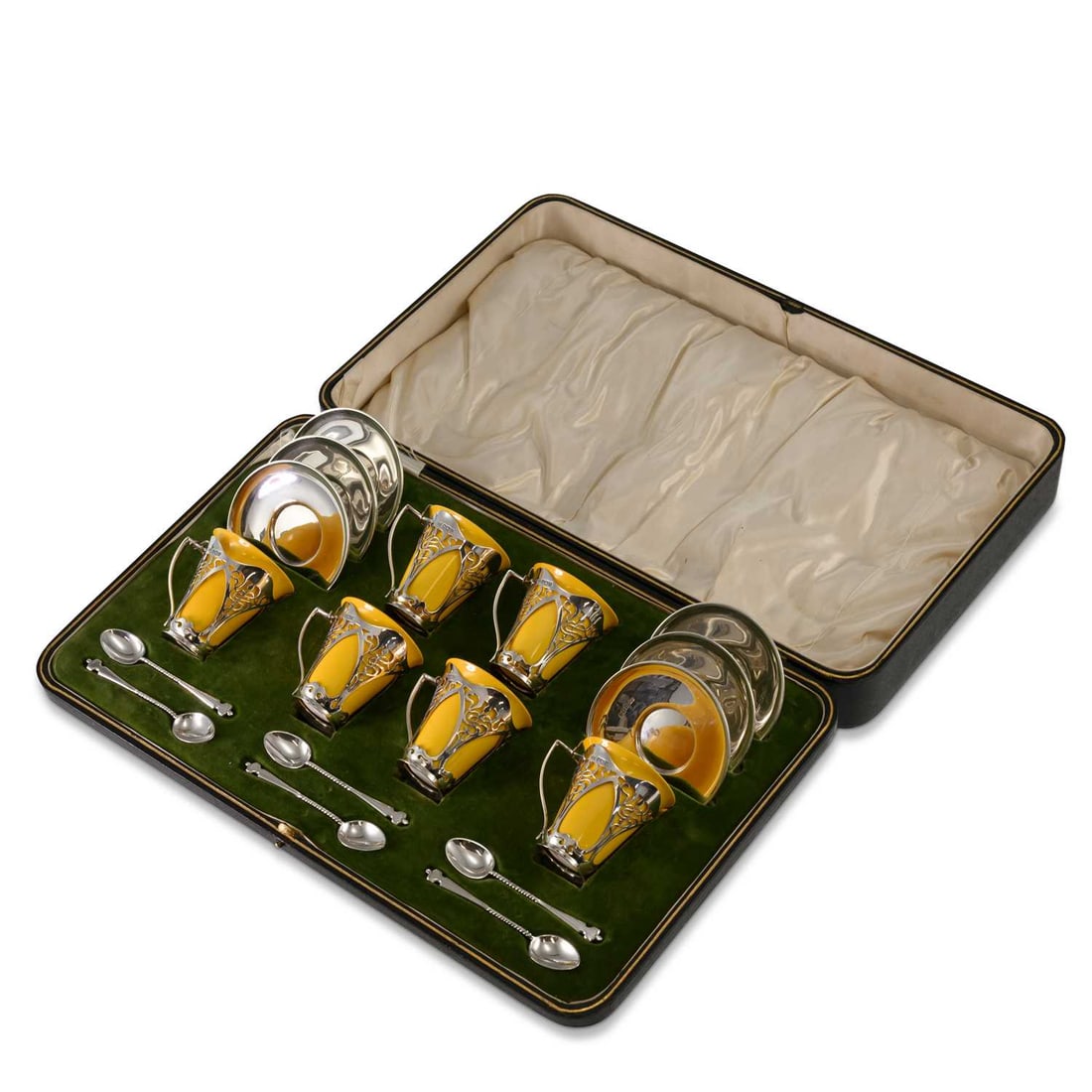A CASED ART NOUVEAU SILVER-MOUNTED ROYAL DOULTON COFFEE SERVICE: A CASED ART NOUVEAU SILVER-MOUNTED ROYAL DOULTON COFFEE SERVICE by Roberts & Belk Ltd, Sheffield 1909, comprising six cups, six silver saucers and six silver spoons. Cups 6.2cm high, plates 4.8 tr