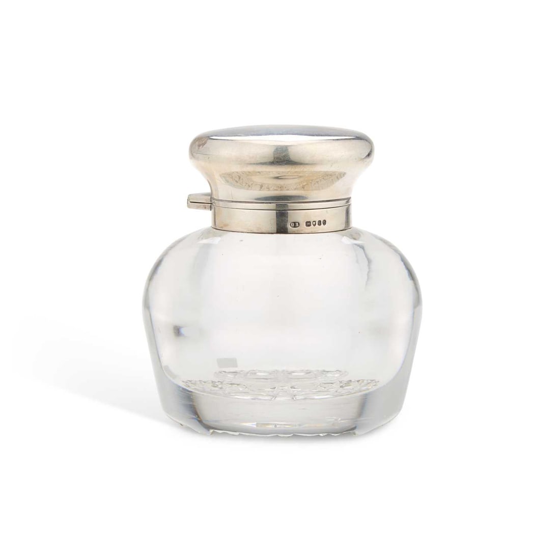 AN EARLY VICTORIAN SILVER-MOUNTED GLASS INKWELL: AN EARLY VICTORIAN SILVER-MOUNTED GLASS INKWELL maker's mark GB, London 1835, the hinged cover of plain polished form. 10cm high
