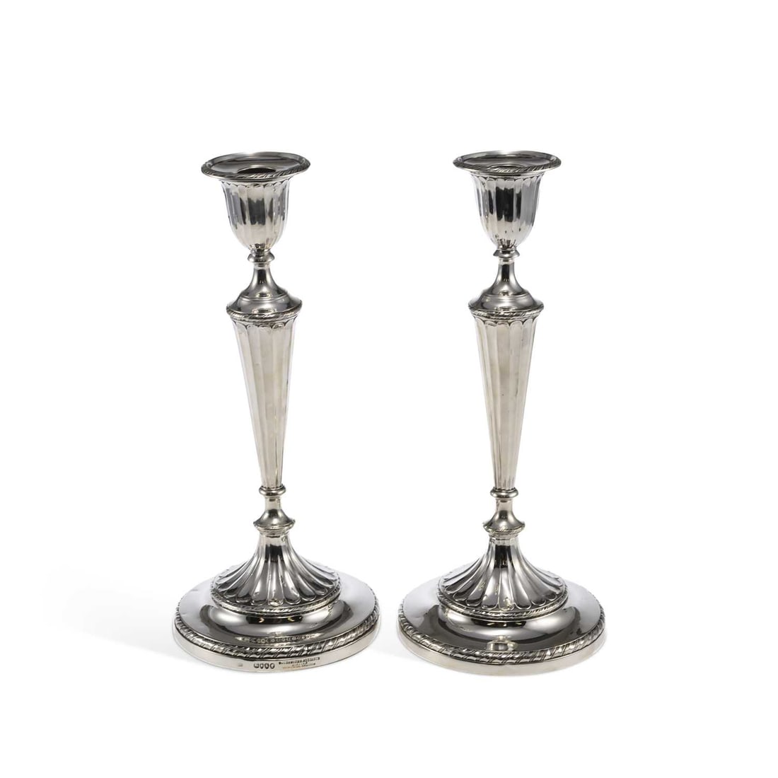 A PAIR OF LATE VICTORIAN SILVER CANDLESTICKS (1 of 2)