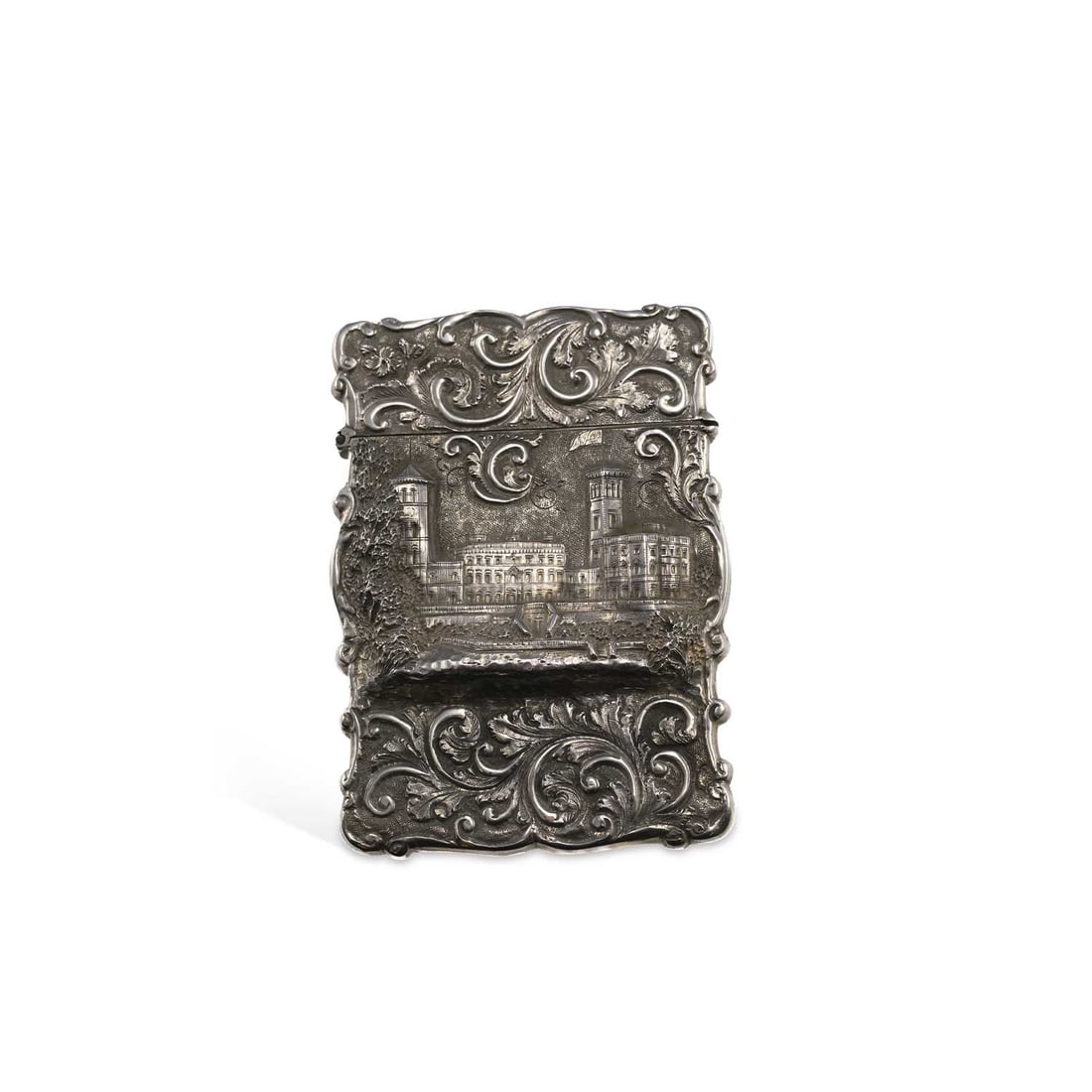 A VICTORIAN SILVER 'CASTLE TOP' CARD CASE: A VICTORIAN SILVER 'CASTLE TOP' CARD CASE by David Pettifer, Birmingham 1857, of shaped rectangular form with a hinged cover, decorated to front in relief with a view of Osborne House amongst scrolls.