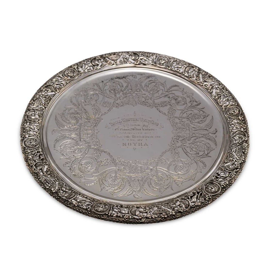 A VICTORIAN 'CELLINI' PRESENTATION SILVER SALVER: A VICTORIAN 'CELLINI' PRESENTATION SILVER SALVER by Stephen Smith & Son, London 1884, of circular form, the cast pierced border with repeating lion, mask and foliate urn motif, on three leaf and l