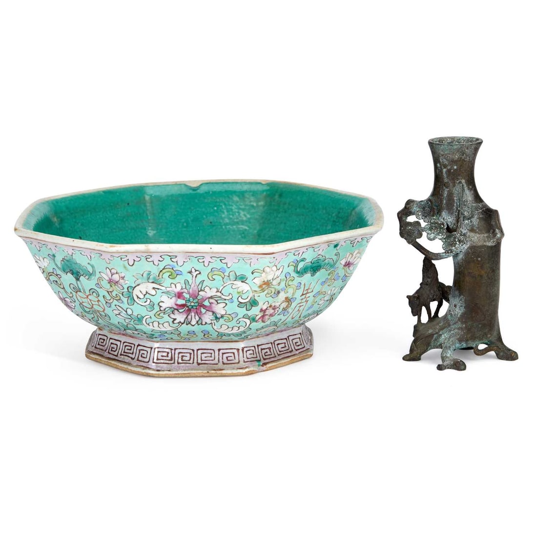 A 19TH CENTURY CHINESE FAMILLE ROSE BOWL: A 19TH CENTURY CHINESE FAMILLE ROSE BOWL of octagonal form, enamel painted with lotus flowers and scrolling tendrils; together with a bronze vase. (2) Bowl 26cm diameter