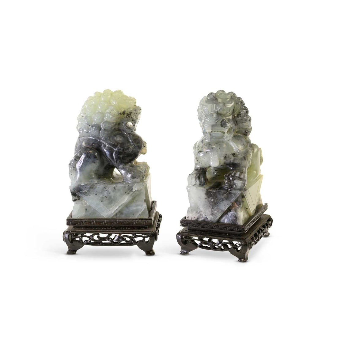 A PAIR OF CARVED HARDSTONE LION DOGS (1 of 2)