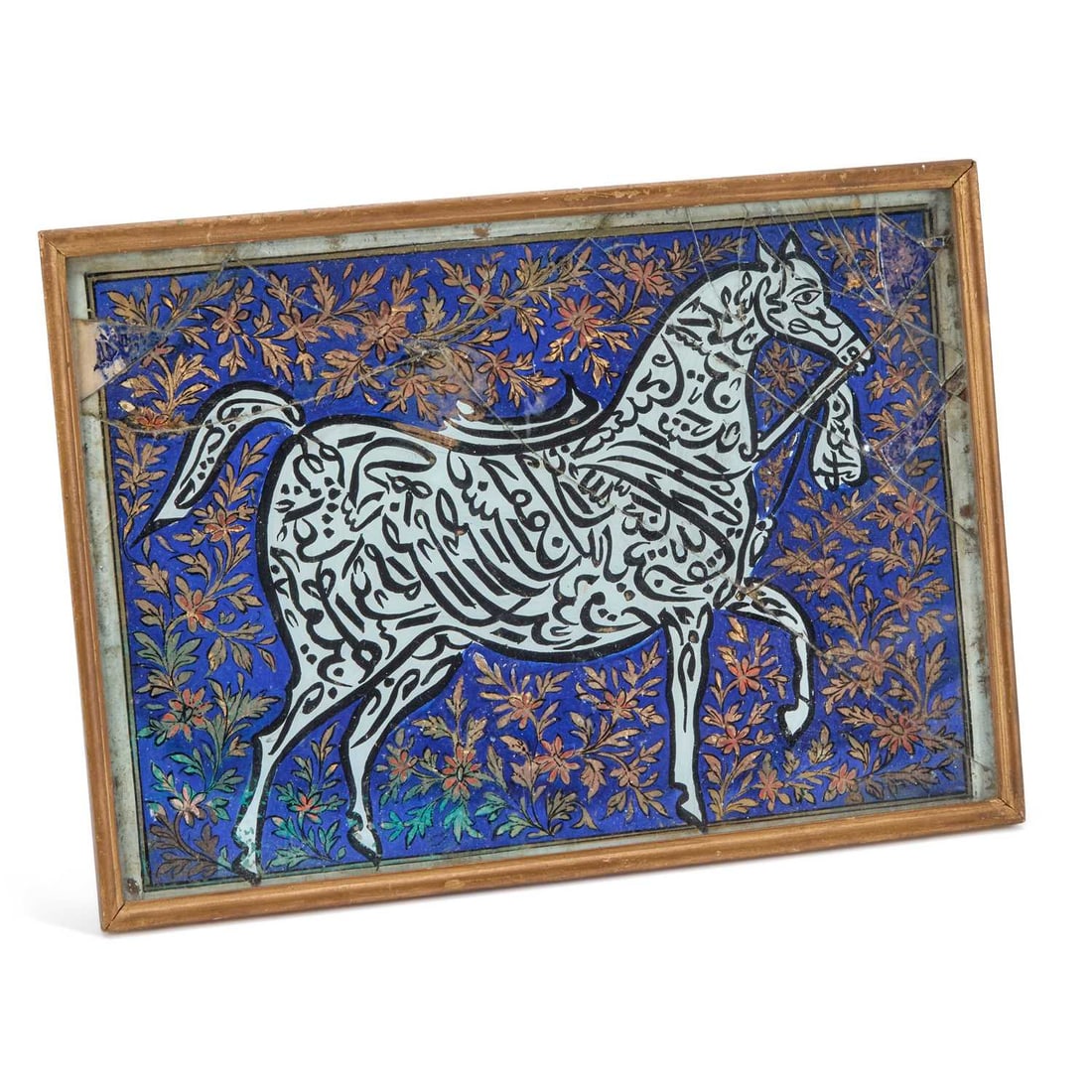A PERSIAN CALLIGRAPHIC COMPOSITION IN THE FORM OF A HORSE PROBABLY 19TH CENTURY: A PERSIAN CALLIGRAPHIC COMPOSITION IN THE FORM OF A HORSE PROBABLY 19TH CENTURY depicting a bridled horse reserved in white against a deep cobalt blue ground, surrounded by scrolling floral decoration
