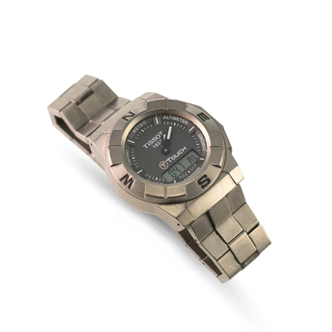 A GENTS TITANIUM TISSOT T-TOUCH BRACELET WATCH: A GENTS TITANIUM TISSOT T-TOUCH BRACELET WATCH the circular grey dial signed Tissot 1853 T-Touch, with compass bezel, integral three-row bracelet with a folding central clasp. Case diameter 43mm