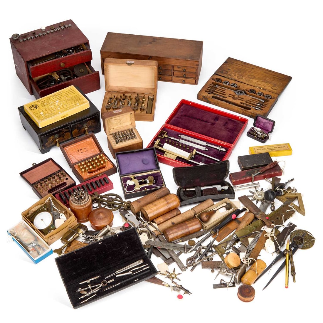 A LARGE COLLECTION OF VINTAGE WATCHMAKERS TOOLS CIRCA 1900: A LARGE COLLECTION OF VINTAGE WATCHMAKERS TOOLS CIRCA 1900 including a Hand Remover; Bergeon Bush Set; a Screw Head Tool; a Mainspring Winding Set; a Pivot Drilling Tool; a Hairspring Gauge; etc. (Qty